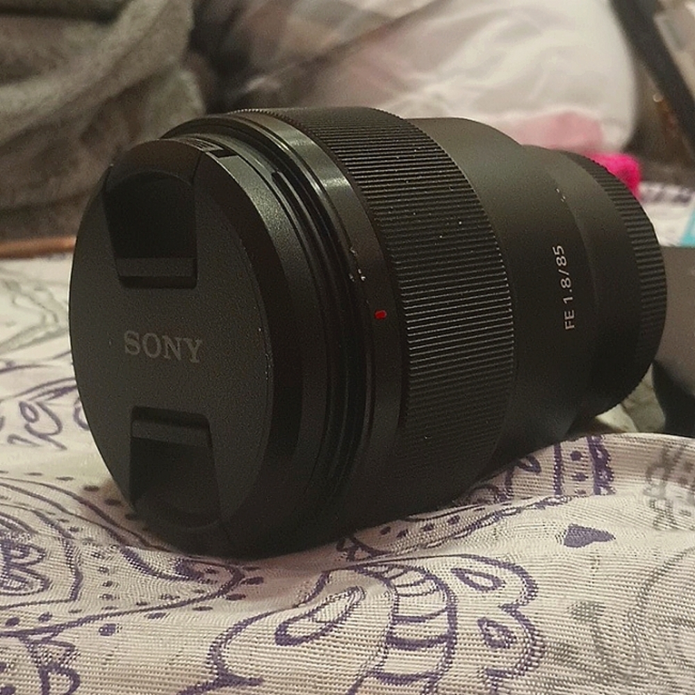 A Sony FE 85mm f/1.8 lens